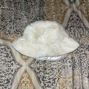 White furry bucket hat